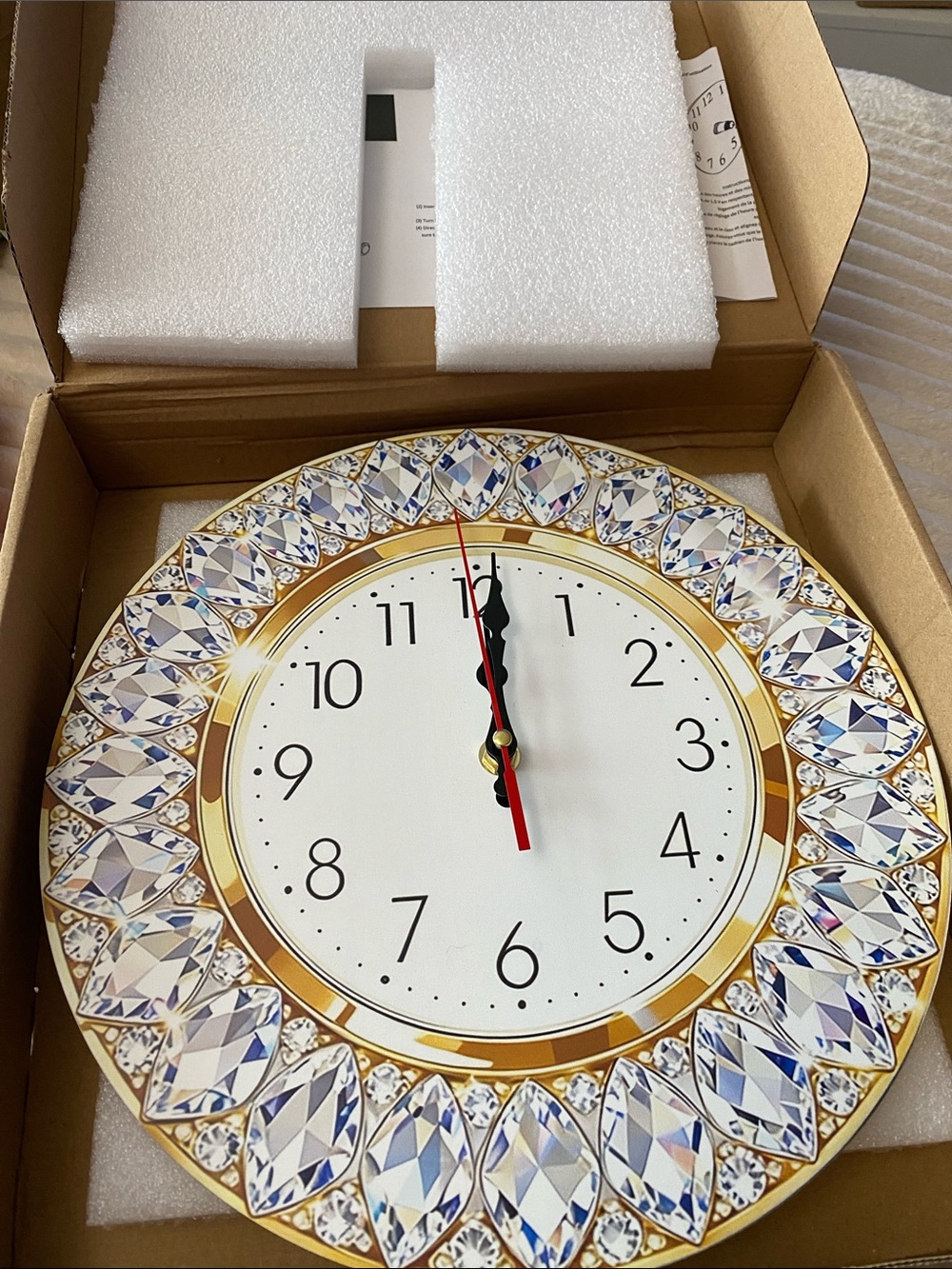 Brand new Elegant Gold and Crystal Wall Clock, not real stones